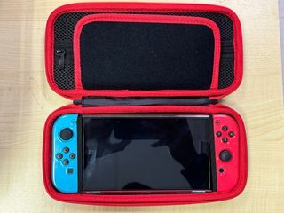 Nintendo Switch OLED with Neon Red & Blue Joycon