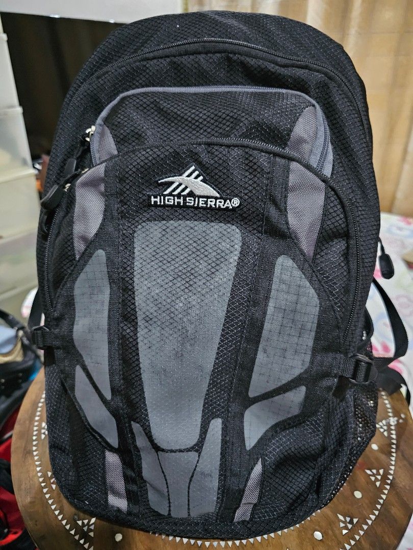 Original High Sierra 3-compartment backpack (Category: Backpacks) located in Pasig City. Submitted by chinitafrommanila (Listing ID 1308356844, Image 1). Description: width and height in photo. depth is about 8 inches original padded adjustable straps, s-shaped too so it's very comfortable for long wear lifetime warranty tech spot laptop compartment (fully padded) - 12.5 x 11 inches (fits 15 inch laptops) has yoke adjustments to adjust size of ba