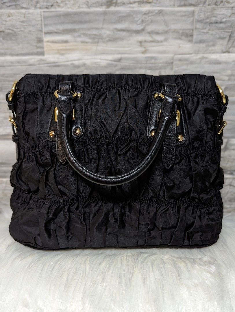 Prada BR5116 Tessuto Soft Calfskin (Category: Luxury Bags & Wallets) located in Manila. Submitted by facet.ornament (Listing ID 1308441933, Image 2). Description: Prada BR116 Tessuto Soft Calfskin Nero Bag in Gold hardware Made in Italy with dust bag, detachable sling strap, care cards Like new Seldom used Gold hardware in prestine condition No rubs on the handle and sides.