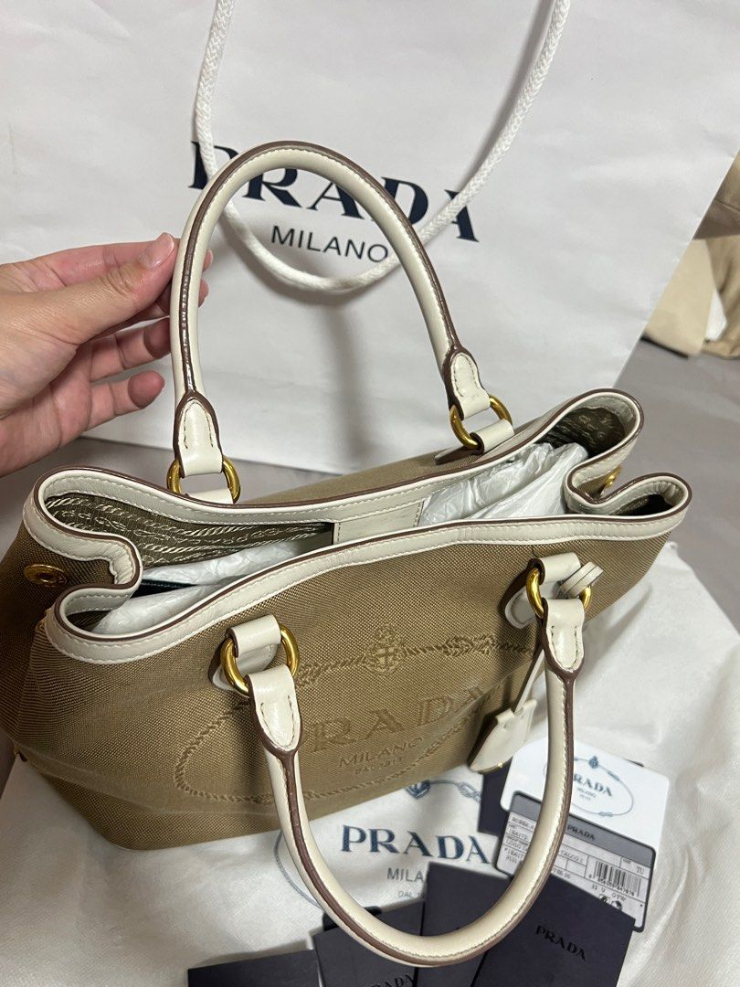 PRADA JACQUARD CROSSBODY (Category: Luxury Bags & Wallets) located in Paranaque City. Submitted by mimibernardo (Listing ID 1308342249, Image 3). Description: Selling my Prada Jacquard Crossbody bag You can wear it crossbody or hand bag Still in very good condition There’s a little tear inside the bag but not noticeable. Complete with dust bag, care card and paperbag RFID card included so you can the authenticity of the bag..