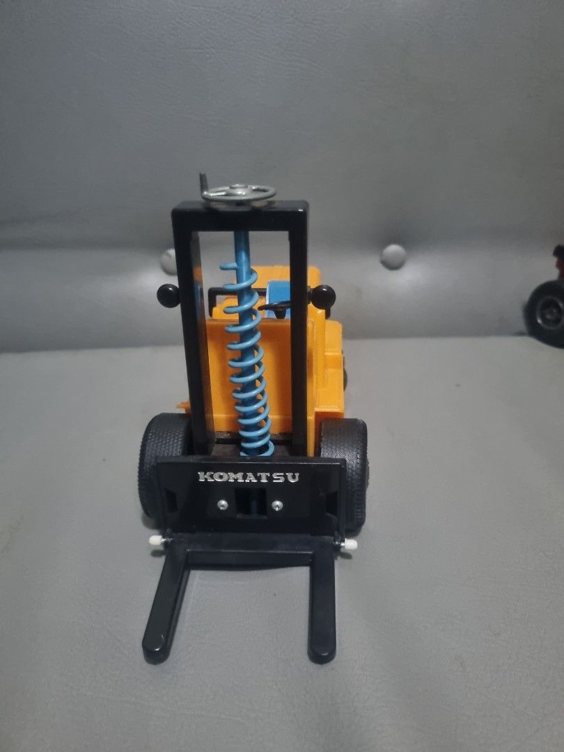Vintage Aoshin KOMATSU FORKLIFT M45 (Category: Industrial Equipment) located in Silang. Submitted by samflores2k4t7 (Listing ID 1308458474, Image 2). Description: for sale Aoshin KOMATSU FORKLIFT M45 plastic body/tin chassis Made in Japan 8 inches Lenght 6 imches height issue damage seat forklift not working.