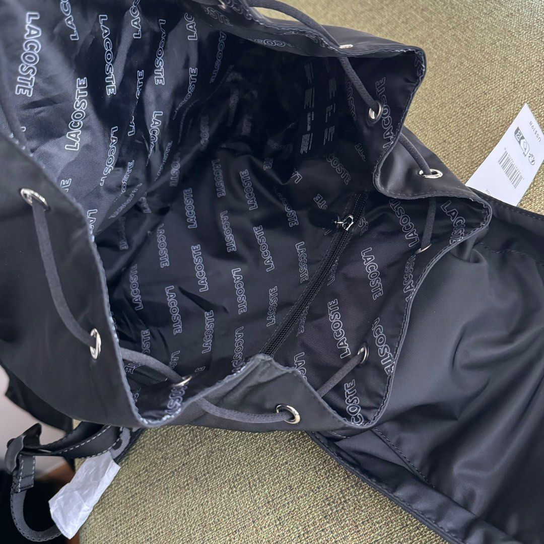 Authentic Brand new Lacoste Nylon backpack Black (Category: Backpacks) located in Quezon City. Submitted by thingsforless (Listing ID 1308592923, Image 3). Description: Brand new Authentic lacoste Nylon material Black backpack.