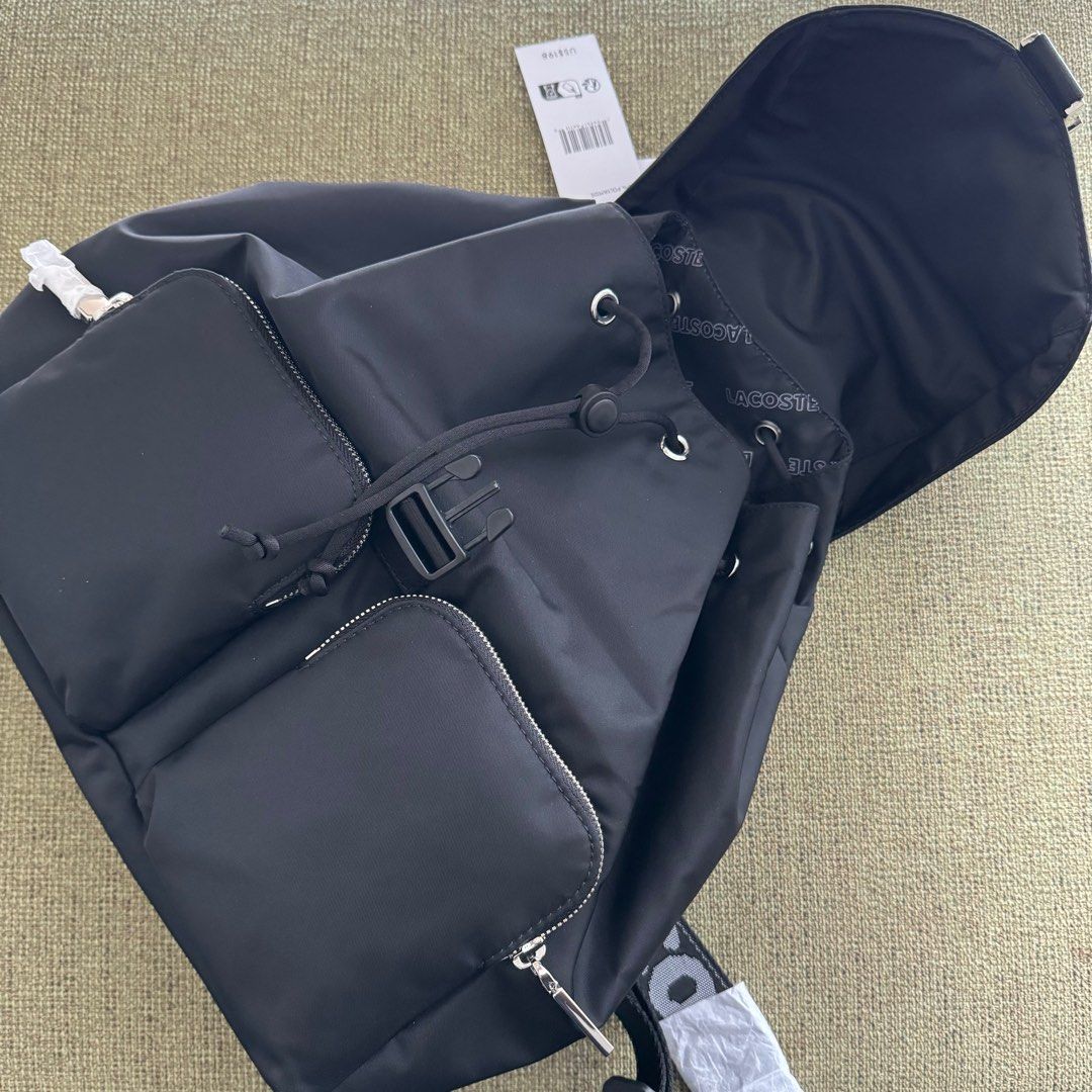Authentic Brand new Lacoste Nylon backpack Black (Category: Backpacks) located in Quezon City. Submitted by thingsforless (Listing ID 1308592923, Image 2). Description: Brand new Authentic lacoste Nylon material Black backpack.