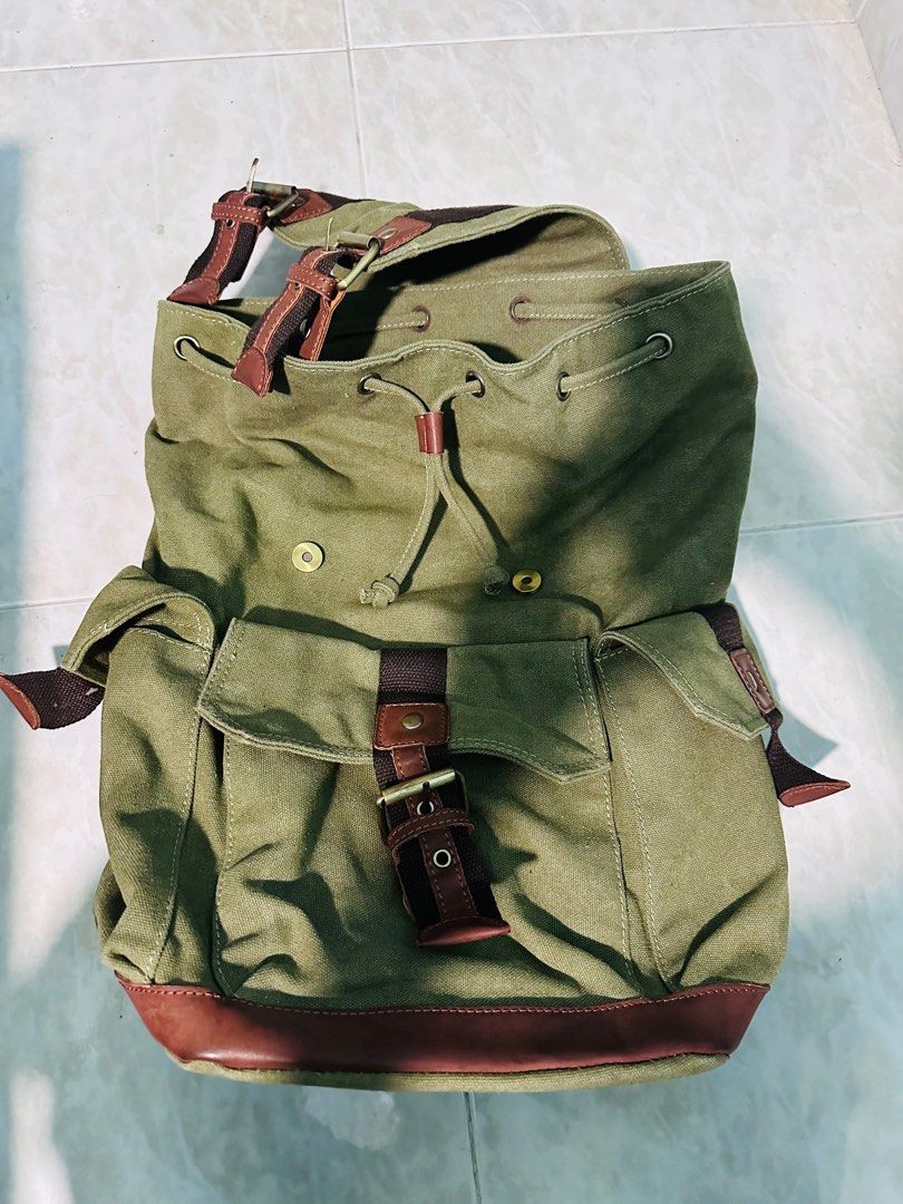 Backpack (Category: Backpacks) located in Singapore. Submitted by aasheri (Listing ID 1308659536, Image 3). Description: Dimension : Height 45cm x Width 35 cm Can stuff a lot of things inside and got 3 pockets, 2 at the sides and 1 in the middle front. .