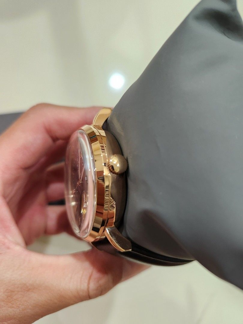 Buzz Germany Automatic Watch (Category: Men's Watches) located in Singapore. Submitted by chngck86 (Listing ID 1308638321, Image 4). Description: *Japan automatic movement *24 hours hand with Sun and Moon display *Open heart design (can see windmil rotating) *Rose gold case with black leather strap *Comes with full box.