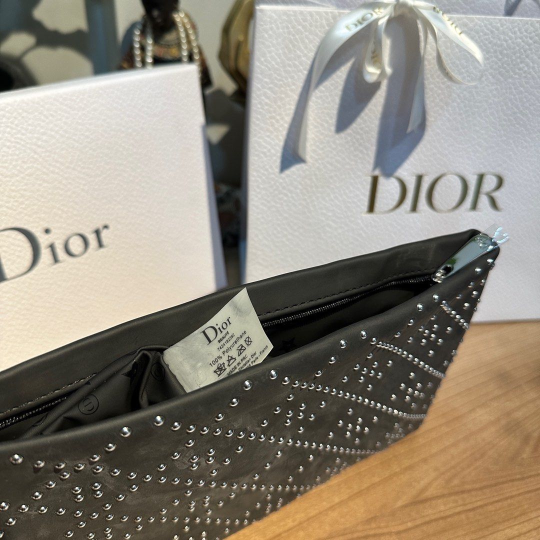 DIOR BLACK STUDDED EXCLUSIVE POUCH 🖤 (Category: Luxury Bags & Wallets) located in Rizal. Submitted by thetopspotfashionboutique (Listing ID 1308654892, Image 2). Description: - WITH ORIGINAL DIOR PAPERBAG - WITH ORIGINAL BOX - COMPLIMENTARY GIFT / GIFT WITH PURCHASE FROM DIOR BEAUTY Measurement: 25x16.