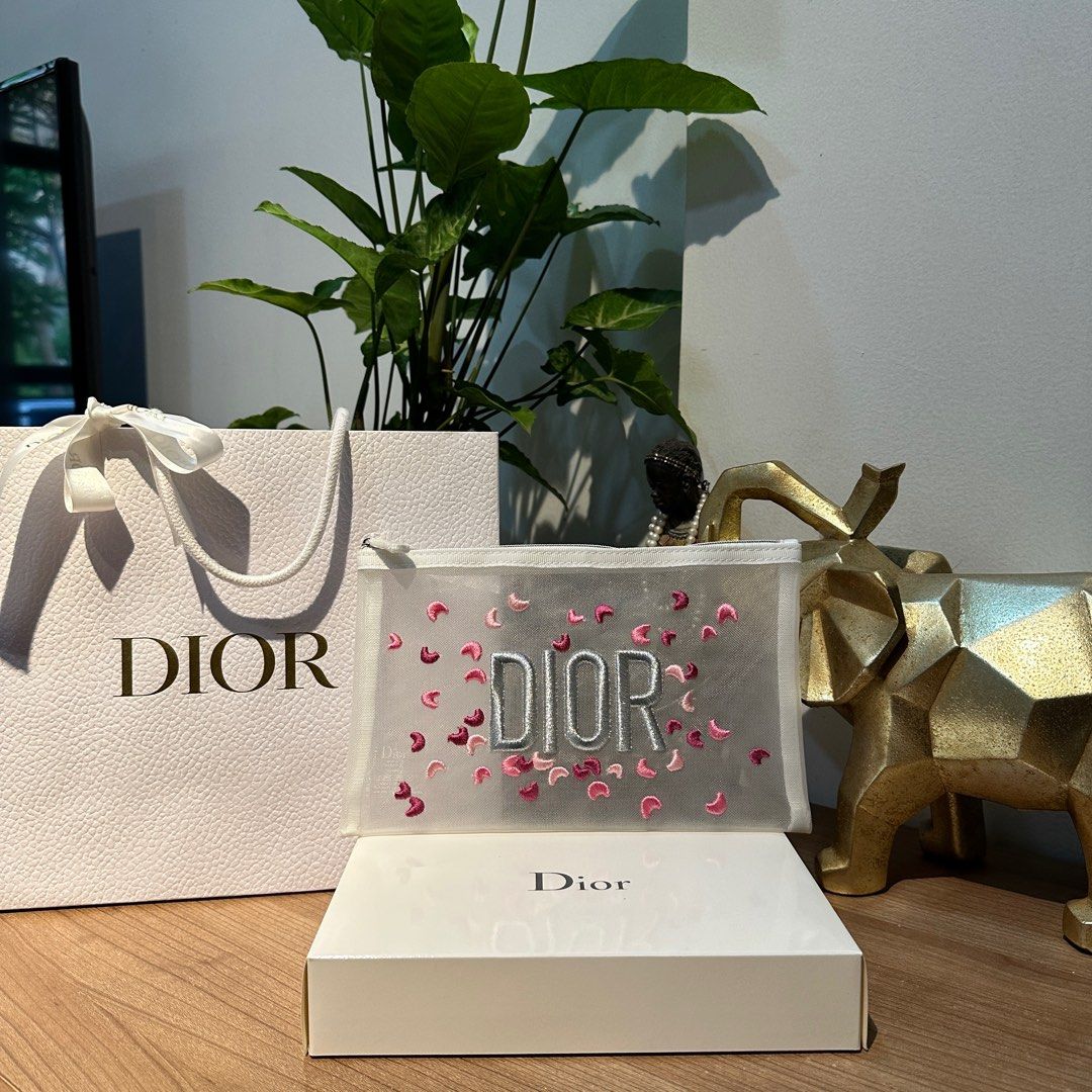 DIOR MESH POUCH WITH HEART PRINTS 💗 (Category: Luxury Bags & Wallets) located in Rizal. Submitted by thetopspotfashionboutique (Listing ID 1308655576, Image 1). Description: - WITH INNER TAGS / ETIKETA - COMPLIMENTARY GIFT / GIFT WITH PURCHASE - WITH ORIGINAL DIOR PAPERBAG - ORIGINAL BOX INCLUDED Measurement:23x14cm .
