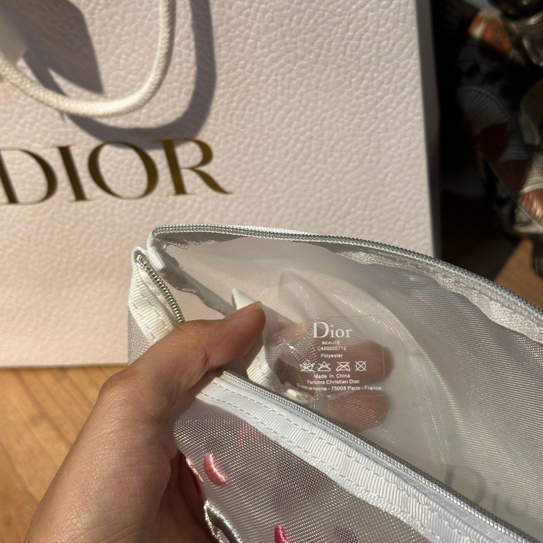 DIOR MESH POUCH WITH HEART PRINTS 💗 (Category: Luxury Bags & Wallets) located in Rizal. Submitted by thetopspotfashionboutique (Listing ID 1308655576, Image 2). Description: - WITH INNER TAGS / ETIKETA - COMPLIMENTARY GIFT / GIFT WITH PURCHASE - WITH ORIGINAL DIOR PAPERBAG - ORIGINAL BOX INCLUDED Measurement:23x14cm .