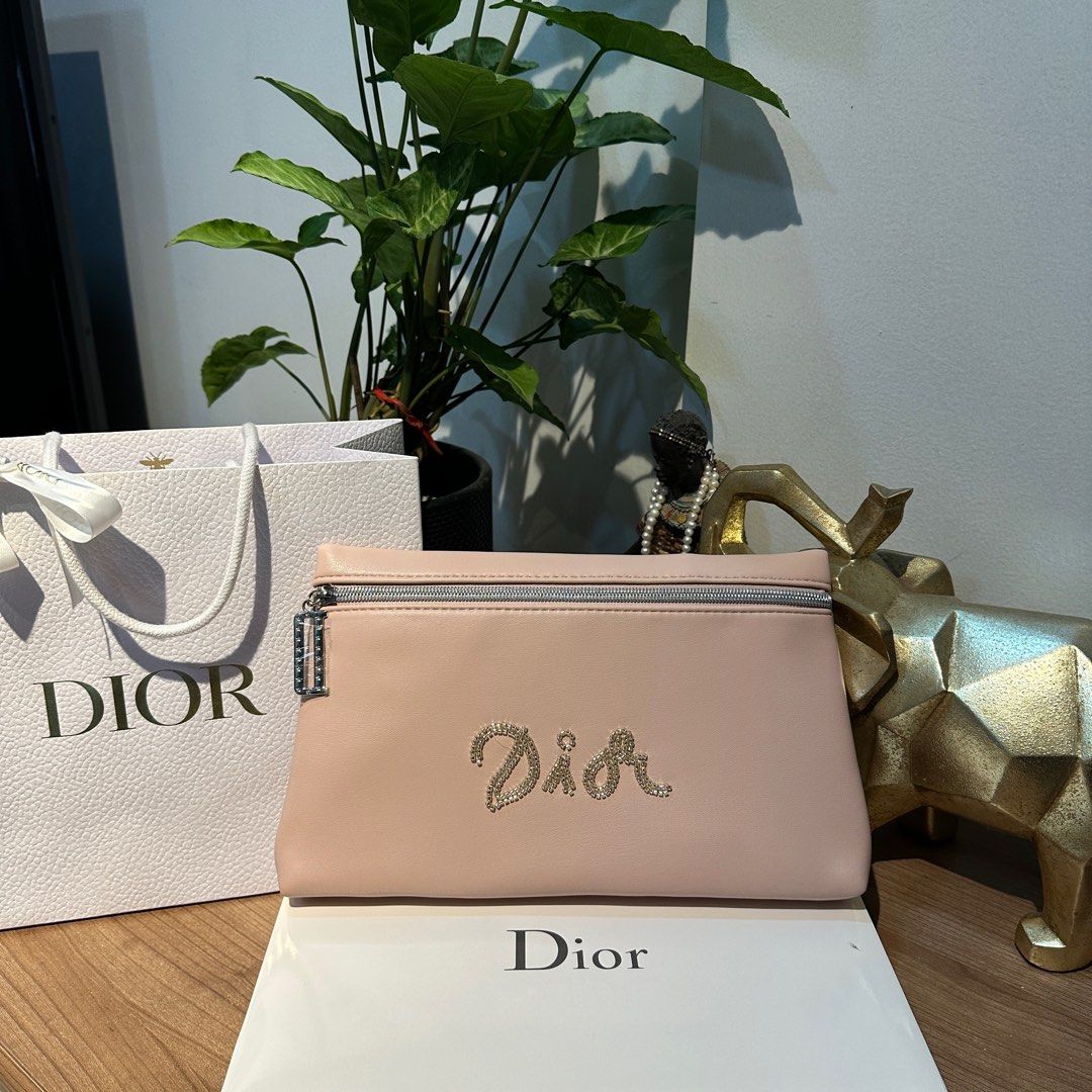 DIOR PINK LEATHER POUCH WITH BEADWORK 🩷 (Category: Luxury Bags & Wallets) located in Rizal. Submitted by thetopspotfashionboutique (Listing ID 1308655095, Image 1). Description: - WITH INNER TAGS / ETIKETA - COMPLIMENTARY GIFT / GIFT WITH PURCHASE - WITH ORIGINAL DIOR PAPERBAG - ORIGINAL BOX INCLUDED Measurement: 28x17cm .