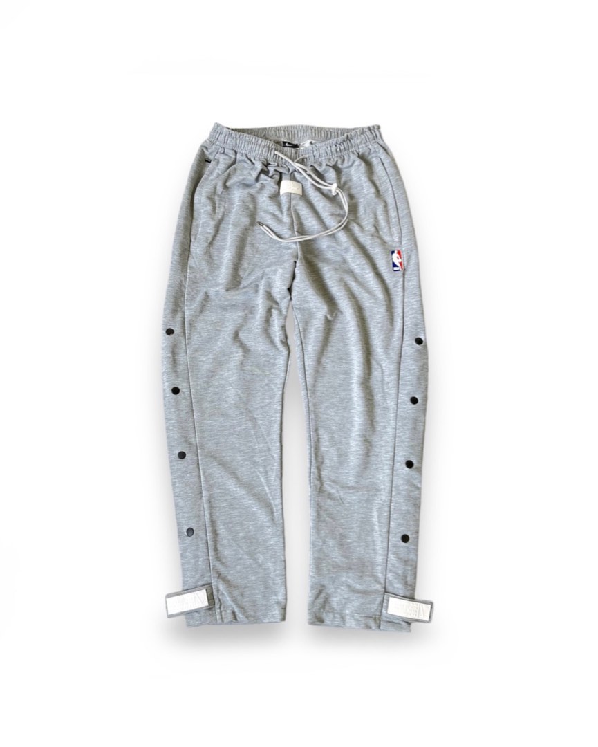 Fear of god x Nike tear away Men s Fashion Bottoms Joggers on Carousell