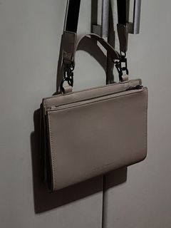 Straightforward DVL Meraki Sling Bag in Light Taupe