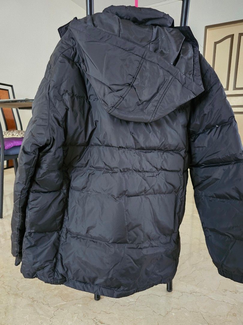 Down jacket (Category: Coats, Jackets and Outerwear) located in Singapore. Submitted by covergirlnu (Listing ID 1308683678, Image 2). Description: Duck down Jacket ( Duck feather ), size 175XL, Brand new, with hood, side pockets, inner pocket . Super Light.. Black colour. Able to keep warm up to negative 5 degrees C. Hood is detachable, attached by Zip..