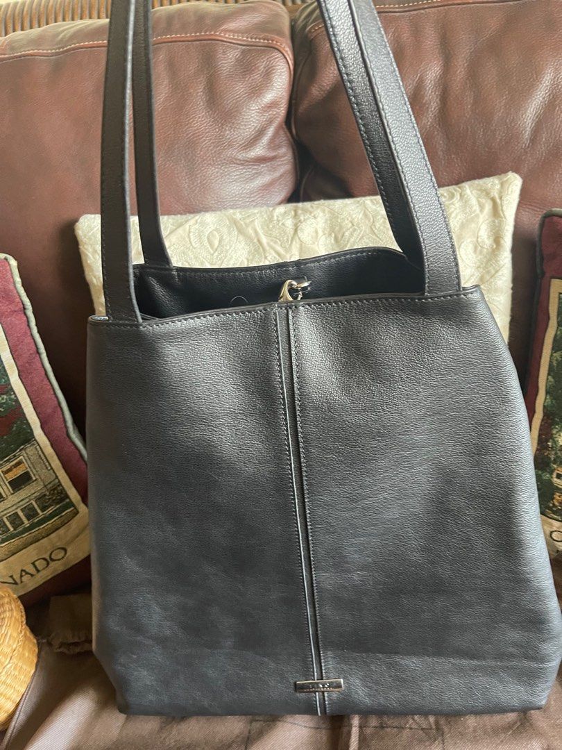 FINO Leather Tote Bag (Category: Luxury Bags & Wallets) located in Makati City. Submitted by diamondbunny888 (Listing ID 1308696288, Image 2). Description: FINO leather tote bag 💯 Guaranteed authentic Brand new, Unisex 5 deep pockets, functional Fits laptop, charger, etc RFS: decluttering MOP: Gcash, BDO, BPI, UB .