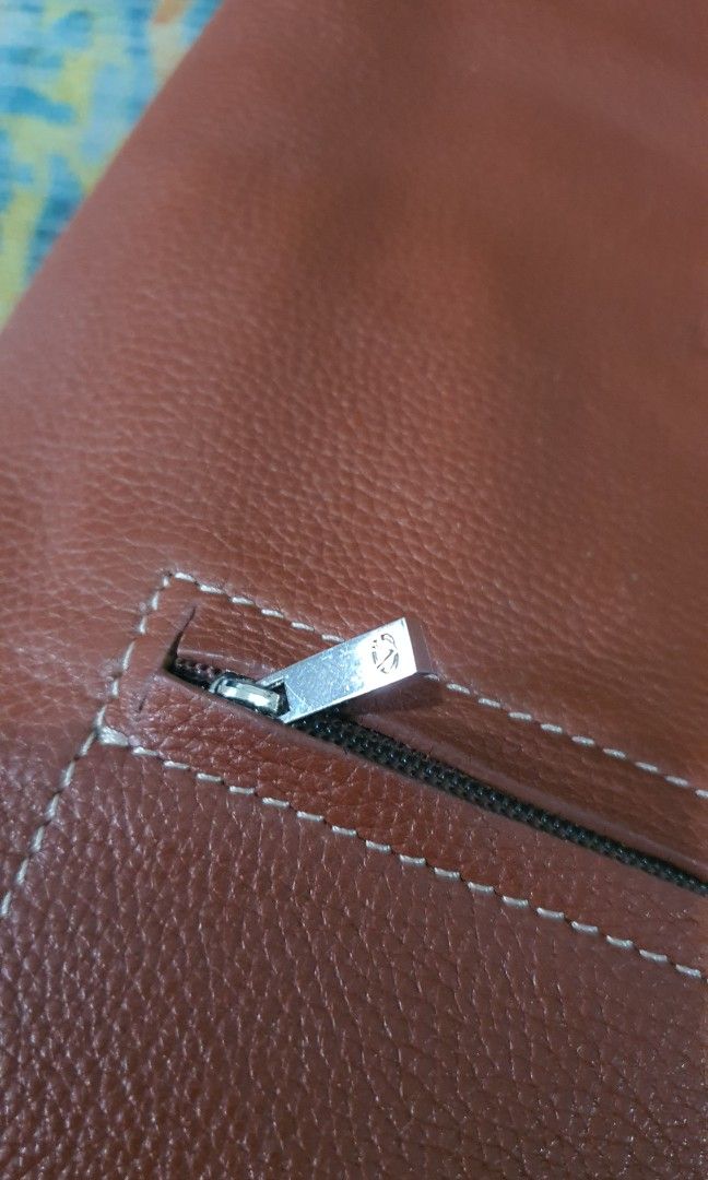 Gianni Valentino leather sling bag (Category: Luxury Bags & Wallets) located in Antipolo. Submitted by switchneighborhood (Listing ID 1308696900, Image 3). Description: total of 9pockets 100% leather pristine condition guaranteed original.