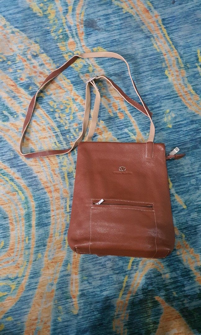 Gianni Valentino leather sling bag (Category: Luxury Bags & Wallets) located in Antipolo. Submitted by switchneighborhood (Listing ID 1308696900, Image 1). Description: total of 9pockets 100% leather pristine condition guaranteed original.