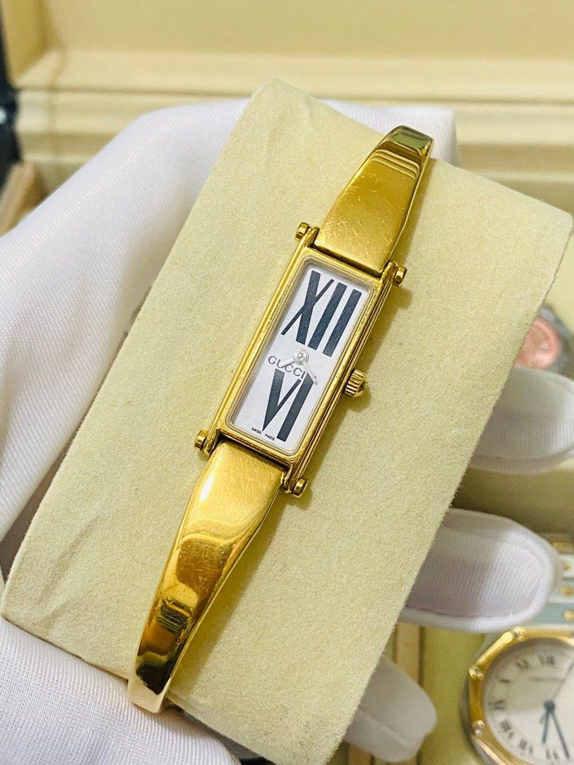 Gucci 1500L Authentic Ladies Watch (Category: Luxury Watches) located in Quezon City. Submitted by clicksmileph (Listing ID 1308763779, Image 3). Description: Gucci 1500L Authentic Ladies Watch Our Price : 10,500 Set with: Presentation box Personal Receipt Details: Gold plated stainless steel watch Rare find White Dial with "Roman Numerals" Design Quartz movement Condition: 8.5/10 Wrist: 6-6.5 inches (Small to medium) Guaranteed Authentic Ideal g