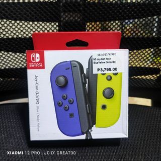 Nintendo Switch Joycon Neon Blue and Yellow Original good as new