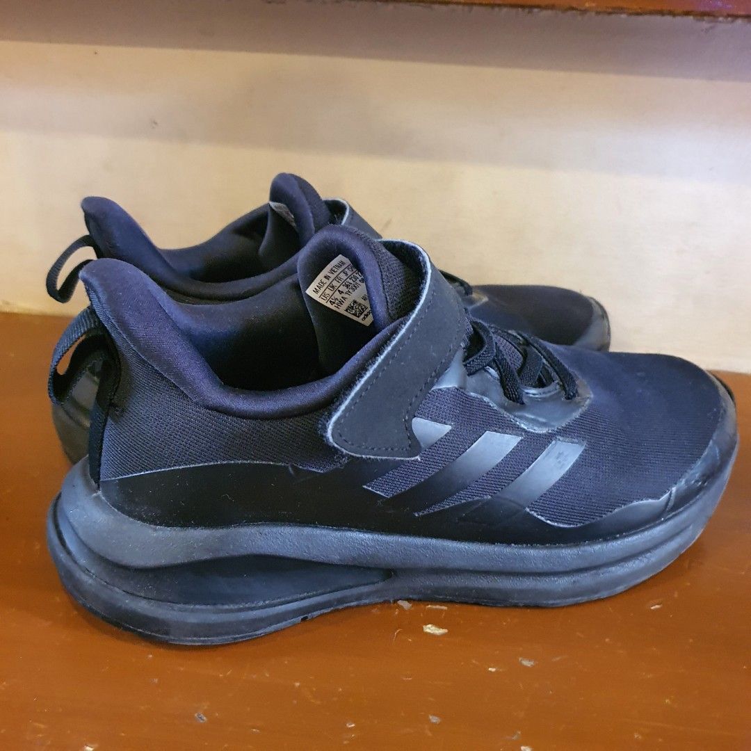 Adidas Forta Run Black Sneakers (Category: Babies & Kids Fashion) located in Cainta. Submitted by kenmaralit (Listing ID 1308841470, Image 1). Description: Adidas Forta Run Black Sneakers for Kids size 4.5 / 22.5cm fits 6 to 8yo Authentic Good condition, replacement box RFS: outgrown, decluttering PM for other details. TY!🙂.