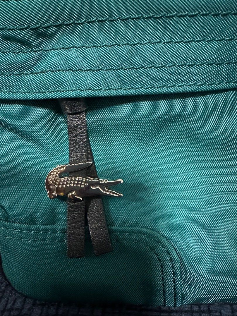 Authentic 3 way Lacoste nylon bag (Category: Luxury Bags & Wallets) located in Pasig City. Submitted by pearlovesjohann (Listing ID 1308911674, Image 2). Description: Can be a belt bag, chest bag or sling From Japan.