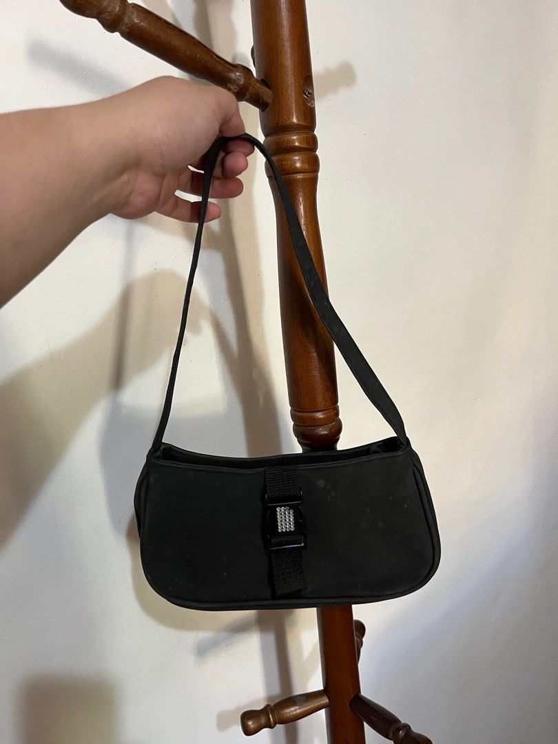 Black mini kili bag (Category: Shoulder Bags) located in Bulacan. Submitted by declutterwitharia (Listing ID 1308943052, Image 2). Description: unused and stored lng. with some white stains. one crystal missing on front part. very nice & makapal yung fabric material. pls see pics for the flaws ☺️.