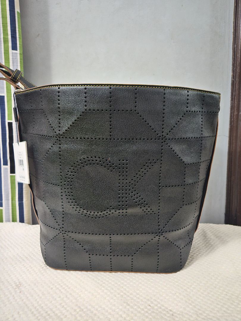 Calvin Klein Shelby Pebble Large Hobo (Category: Luxury Bags & Wallets) located in Makati City. Submitted by KuWeLaDevil01 (Listing ID 1308925888, Image 1). Description: All Authentic, never used with original strap and brass hardware (it’s still wrapped). The geometric perforations is a Calvin Klein hobo signature and has a magnetic snap closure. The leather is rugged but feels very nice to brush your palms on. Main compartment is huge; it can f