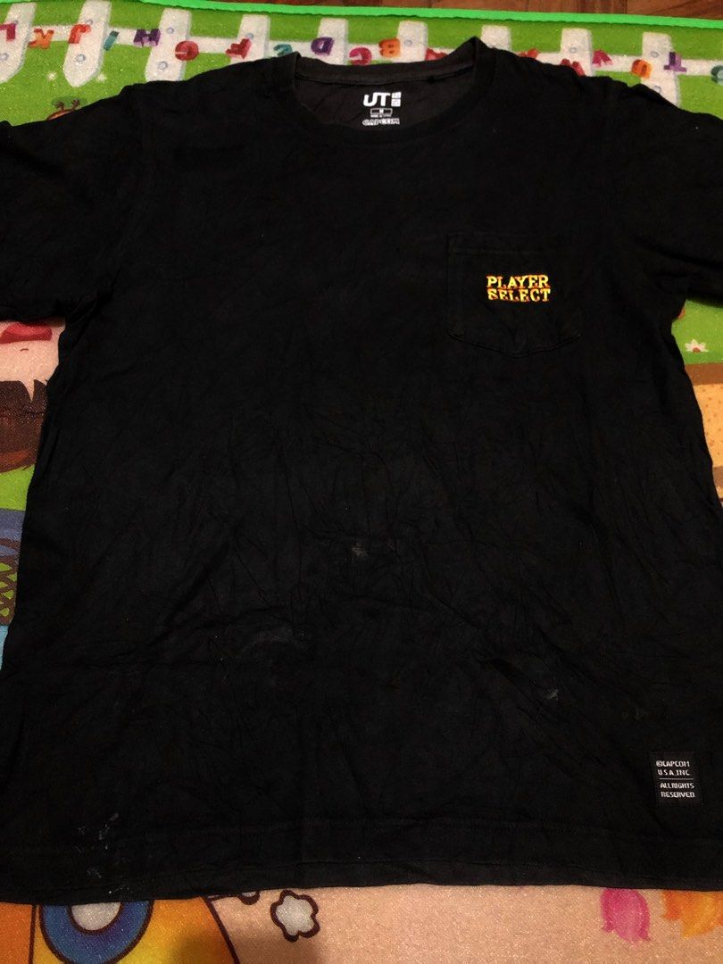 Capcom x Uniqlo (Gaming Shirt) (Category: Tshirts & Polo Shirts ) located in Tuguegarao City. Submitted by emdisplay (Listing ID 1308951790, Image 3). Description: Street Fighter Uniqlo tag (Legit/Authentic) 19.5x25.5 / Small - Medium Flaws: Faded sa batok part at needs wash narin..
