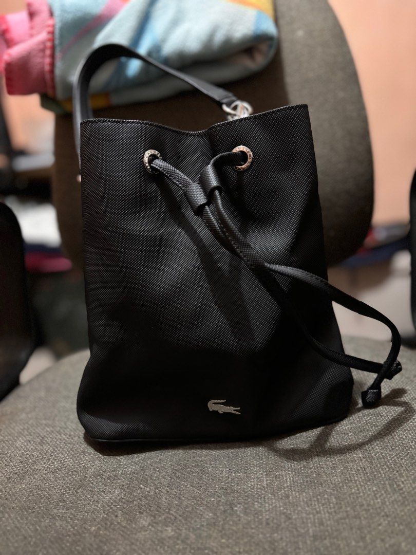 Lacoste bucket bag (Category: Luxury Bags & Wallets) located in Manila. Submitted by che_limpangog (Listing ID 1308927285, Image 1). Description: Lacoste bucket bag well used RFS bawas bag sobrang dami .