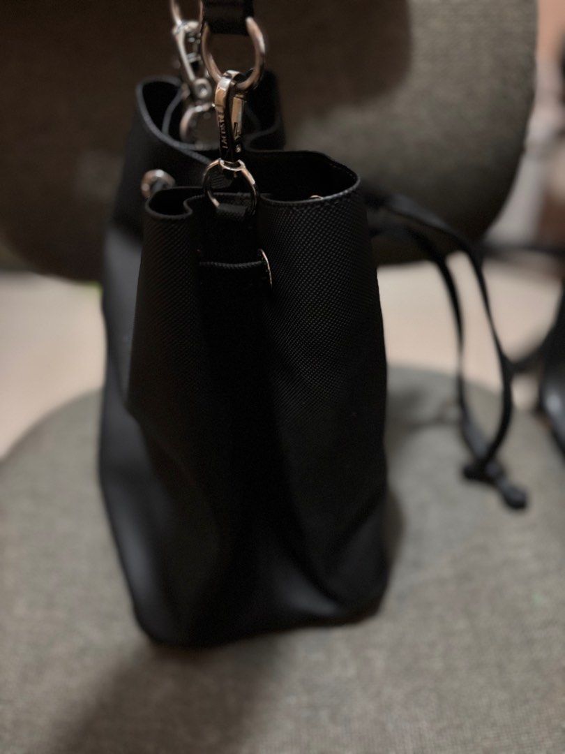 Lacoste bucket bag (Category: Luxury Bags & Wallets) located in Manila. Submitted by che_limpangog (Listing ID 1308927285, Image 2). Description: Lacoste bucket bag well used RFS bawas bag sobrang dami .
