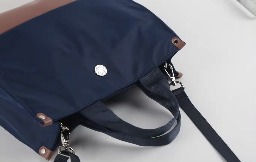 UDC Cross body bag (Category: Cross-body Bags) located in Taguig. Submitted by grayanna (Listing ID 1308959407, Image 2). Description: Brand new UDC tote / cross body bag with bag (kindly check UDC sa online original price 1,3++) RFS: wrong color.
