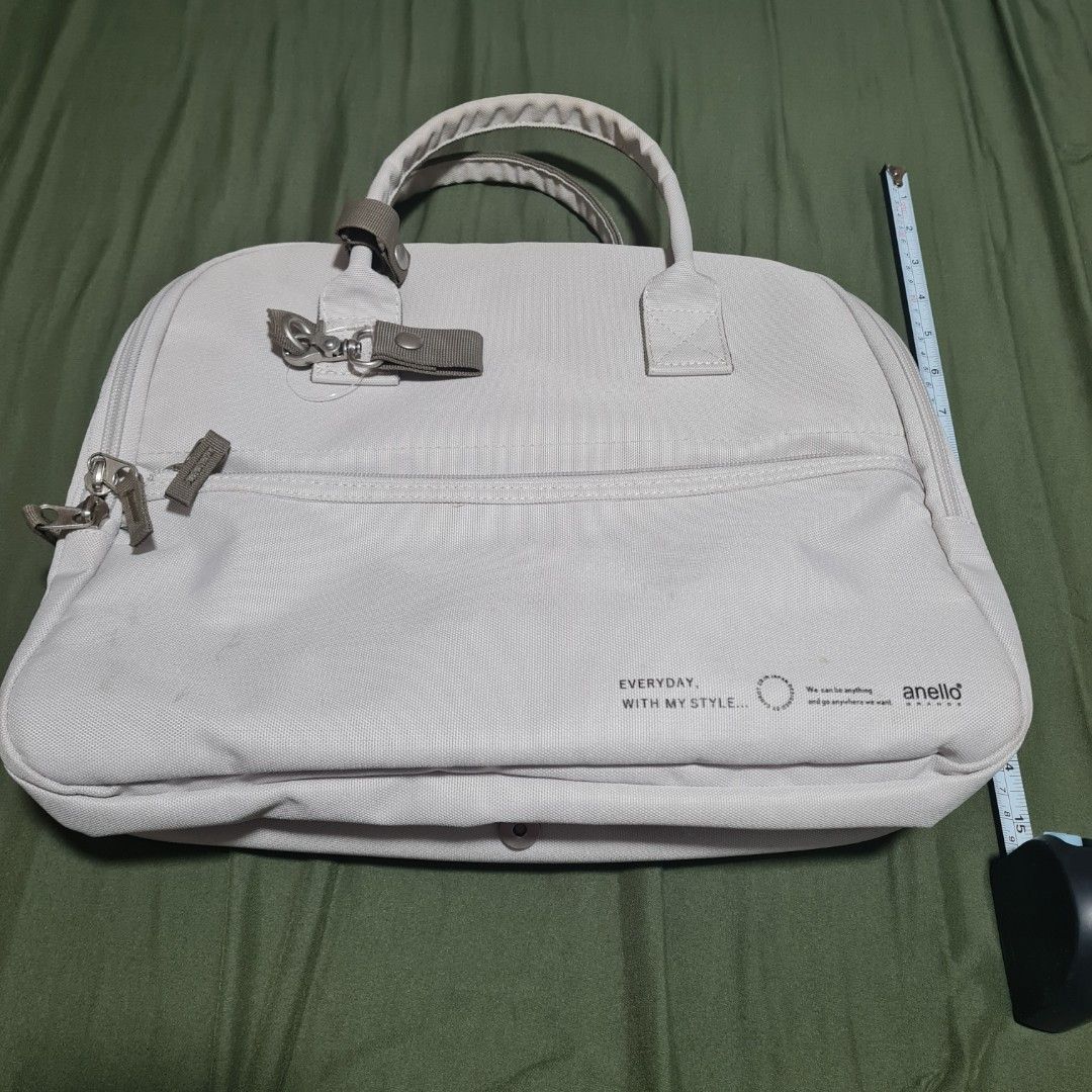 Anello Boston bag in white, A4 size (Category: Shoulder Bags) located in Jaen. Submitted by ceelka (Listing ID 1309100598, Image 2). Description: 🎃 Halloween promo 20% off 🎃 🌸 Please read before chatting 🌸 Anello Grande two-way boston bag in white, A4 size. Can be carried by hand or use the detachable strap for use as a shoulder bag. Lots of pockets, flap allows for easy access to items inside the bag. Bought from Anello store. Price negotiab