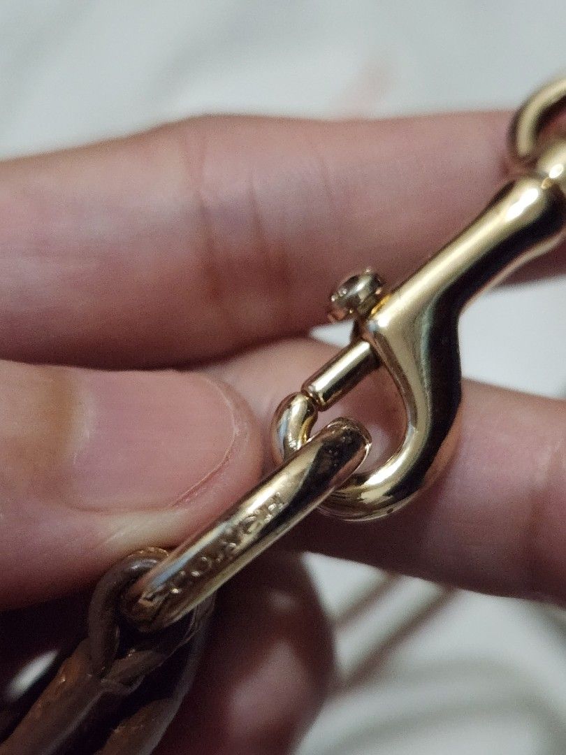 Coach ID Lanyard (Category: Other Accessories) located in Mandaluyong City. Submitted by grachi (Listing ID 1309115210, Image 2). Description: Coach ID Lanyard brown and gold from US price in Zalora is 5k+ but selling it for half the price since it is slightly used.
