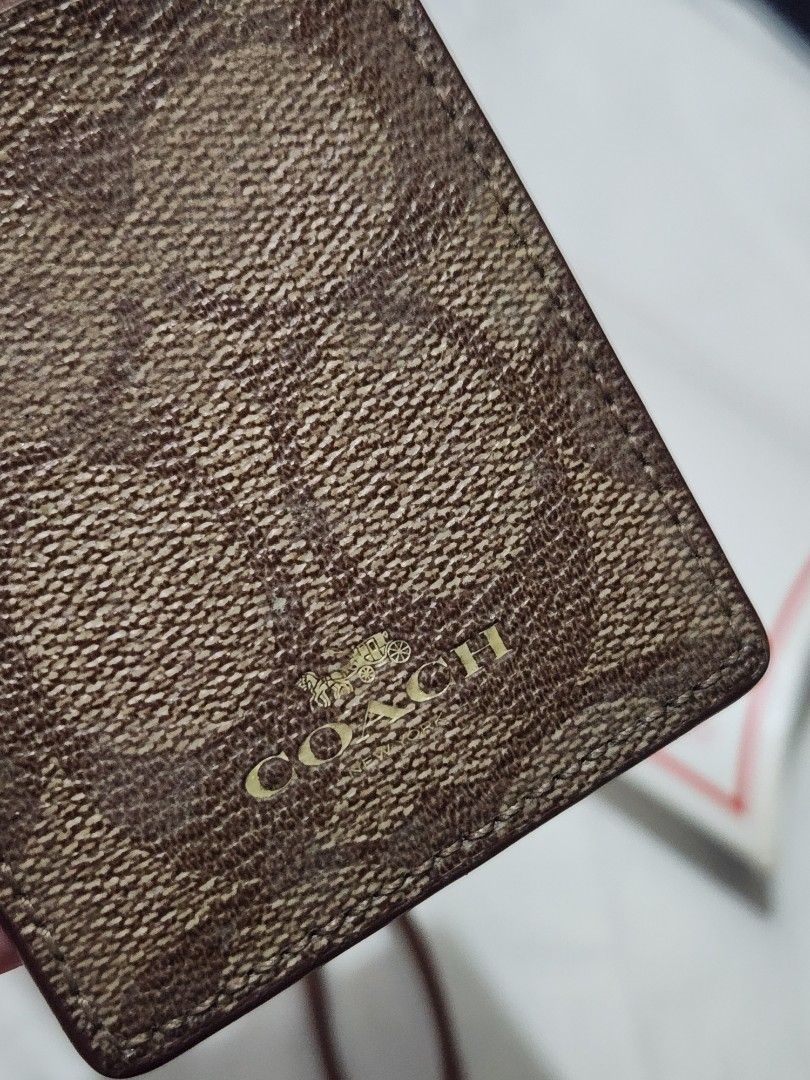 Coach ID Lanyard (Category: Other Accessories) located in Mandaluyong City. Submitted by grachi (Listing ID 1309115210, Image 1). Description: Coach ID Lanyard brown and gold from US price in Zalora is 5k+ but selling it for half the price since it is slightly used.