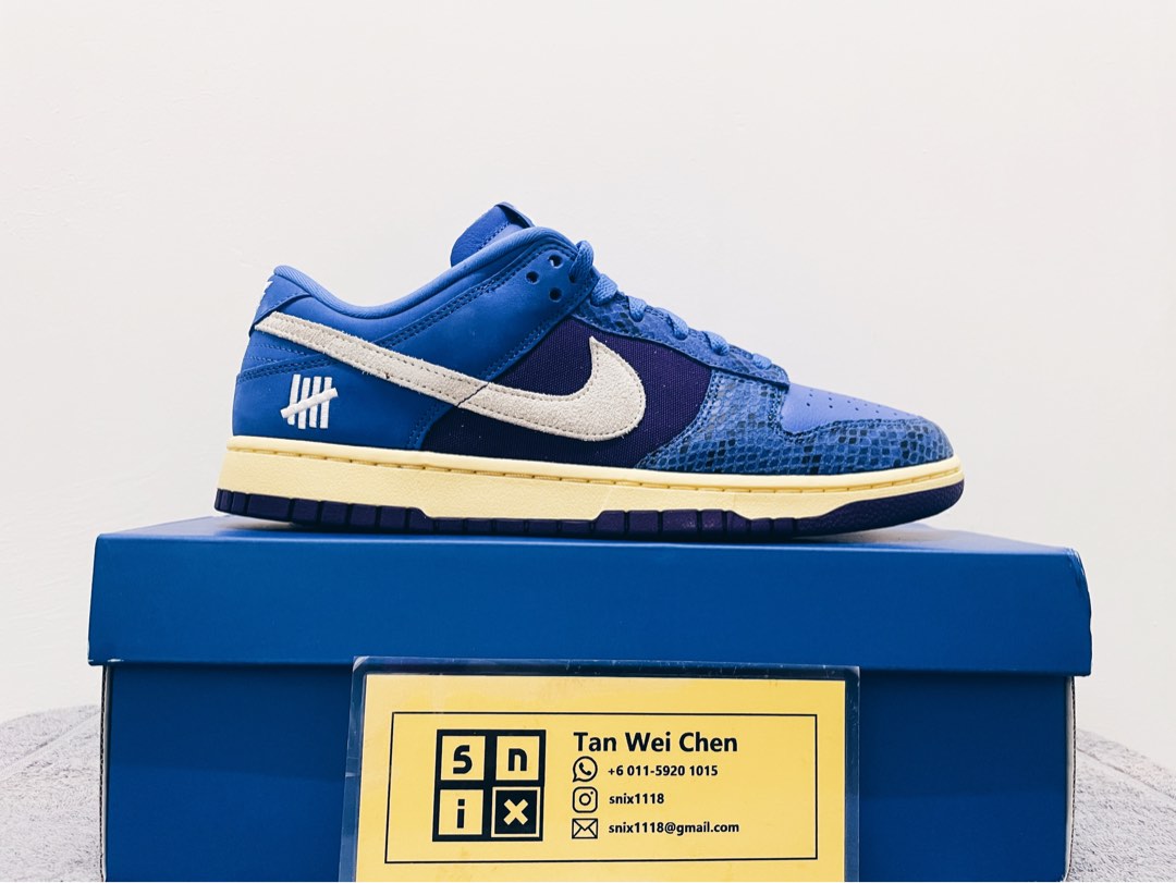 dunk low x undefeated 5 on it