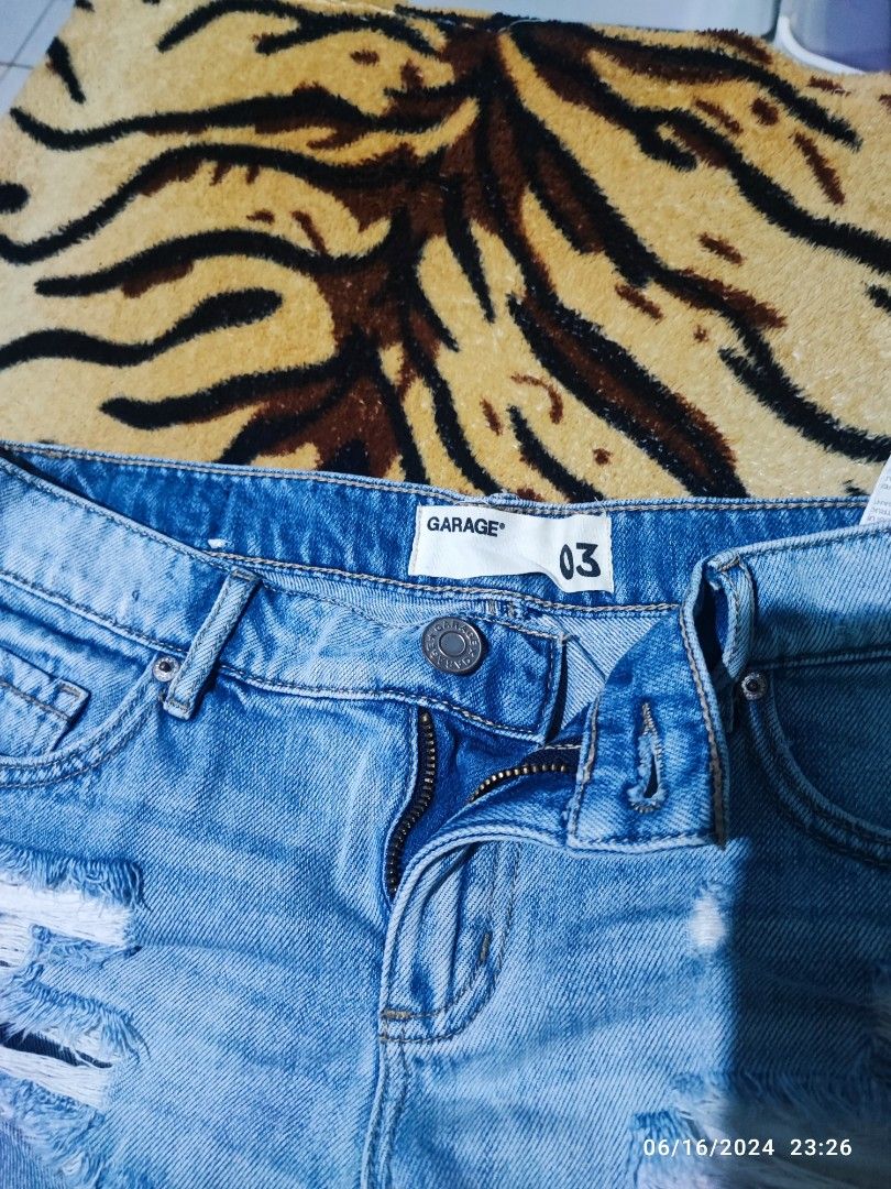 Garage Distressed Denim Shorts (Category: Shorts) located in Caloocan City. Submitted by bluschlez (Listing ID 1309156761, Image 2). Description: store-bought (around 2,000php) seldom used maganda in actual, bagay grunge style ;) small-medium pwede :) nakakasexy!.