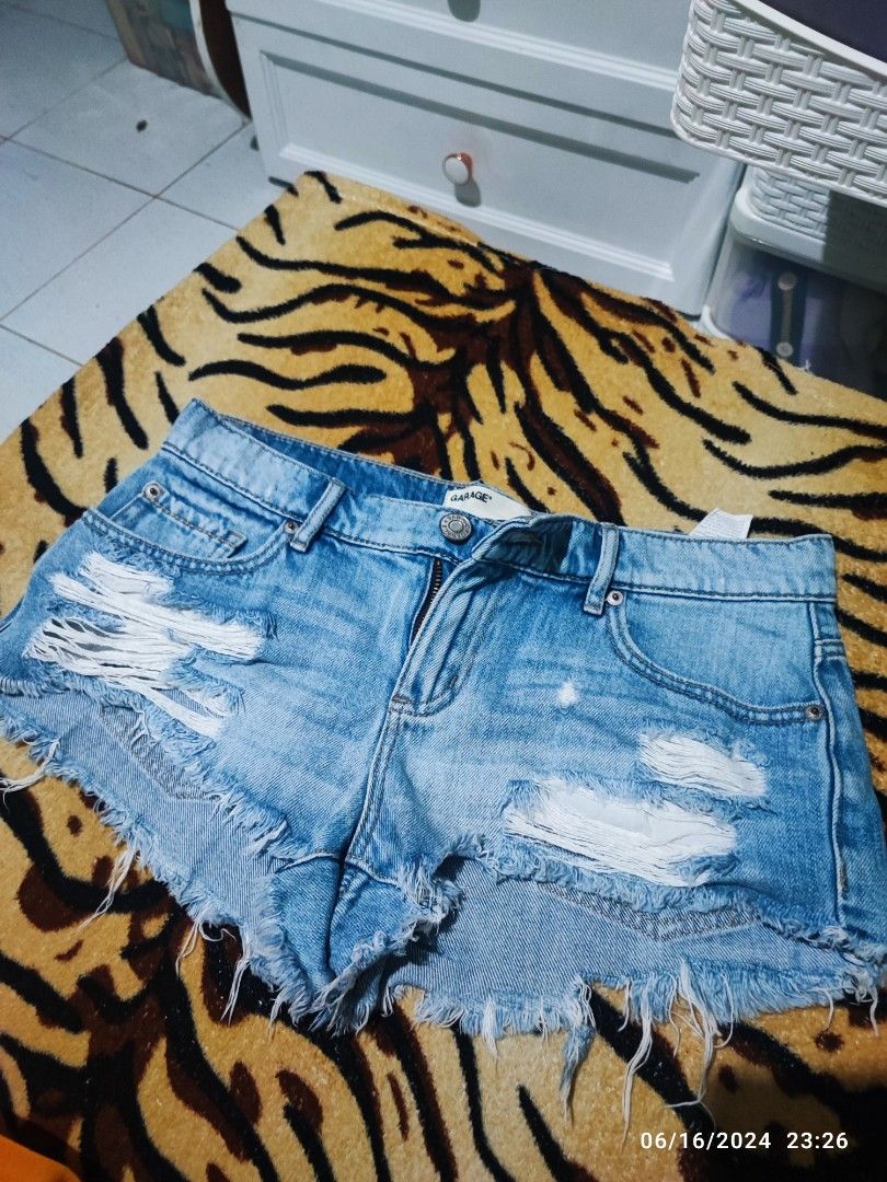 Garage Distressed Denim Shorts (Category: Shorts) located in Caloocan City. Submitted by bluschlez (Listing ID 1309156761, Image 1). Description: store-bought (around 2,000php) seldom used maganda in actual, bagay grunge style ;) small-medium pwede :) nakakasexy!.