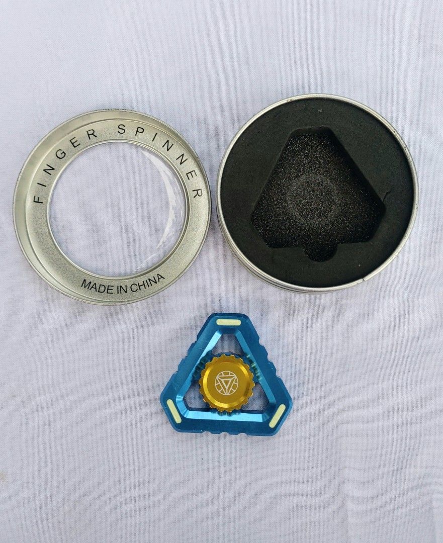Metal Fidget Spinner with container (Category: Action & Battle Toys) located in Lapu Lapu. Submitted by agnesapm_29813 (Listing ID 1309155790, Image 3). Description: Still in very good condition. Glow in the dark spinner..