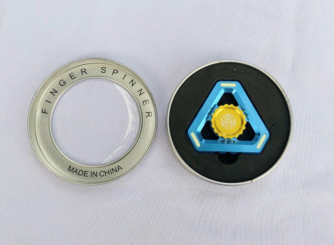 Metal Fidget Spinner with container (Category: Action & Battle Toys) located in Lapu Lapu. Submitted by agnesapm_29813 (Listing ID 1309155790, Image 2). Description: Still in very good condition. Glow in the dark spinner..