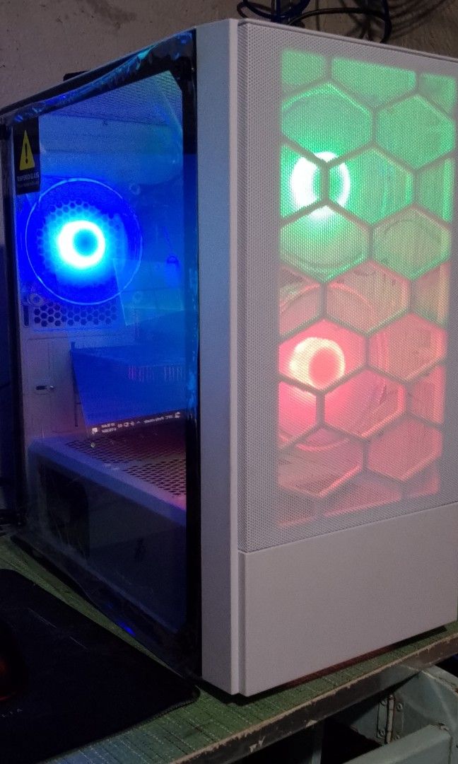 Rush Gaming SYSTEM UNIT (Category: Desktops) located in Pasig City. Submitted by rechellevora (Listing ID 1309136006, Image 2). Description: plug n play salpak mo nlang sa monitor mo can play high settings sa games also good for editing and render specs: Intel core i5 7th generation processor 16GB RAM GTX 1050ti 4GB Video card 240GB SSD 500GB Storage 80+ bronze PSU Key tech tempered glass case with argb fans.