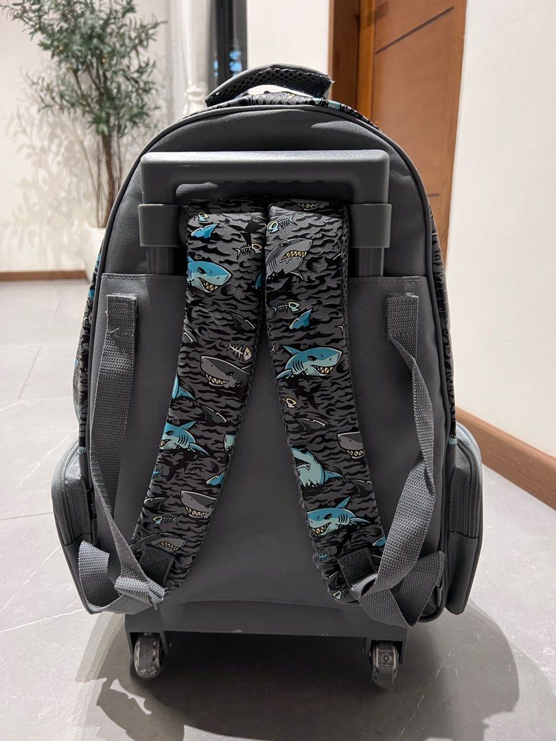 Smiggle Shark Design Trolley backpack (Category: Backpacks) located in Marikina City. Submitted by nicasandoval (Listing ID 1309181617, Image 3). Description: Bought it at 5,900 Rfs: My son doesn’t want to use.