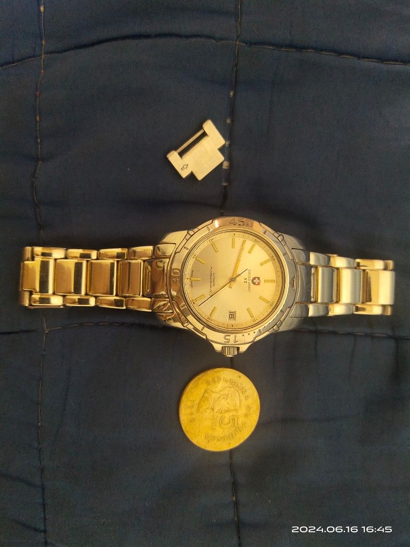 Swiss Army Watch ST (Category: Men's Watches) located in Manila. Submitted by alanroxas.jr (Listing ID 1309087181, Image 1). Description: Swiss Army Watch ST Automatic 25 Jewels Incabloc Conservative Rating: 7.5/10 Fixed bezel Screwdown Crown Good timekeeping (5 Peso coin for size reference only) Meet ups can be arranged (please see indicated meet up places) Shipping can also be arranged only upon prior payment of the price and the shipping fee b