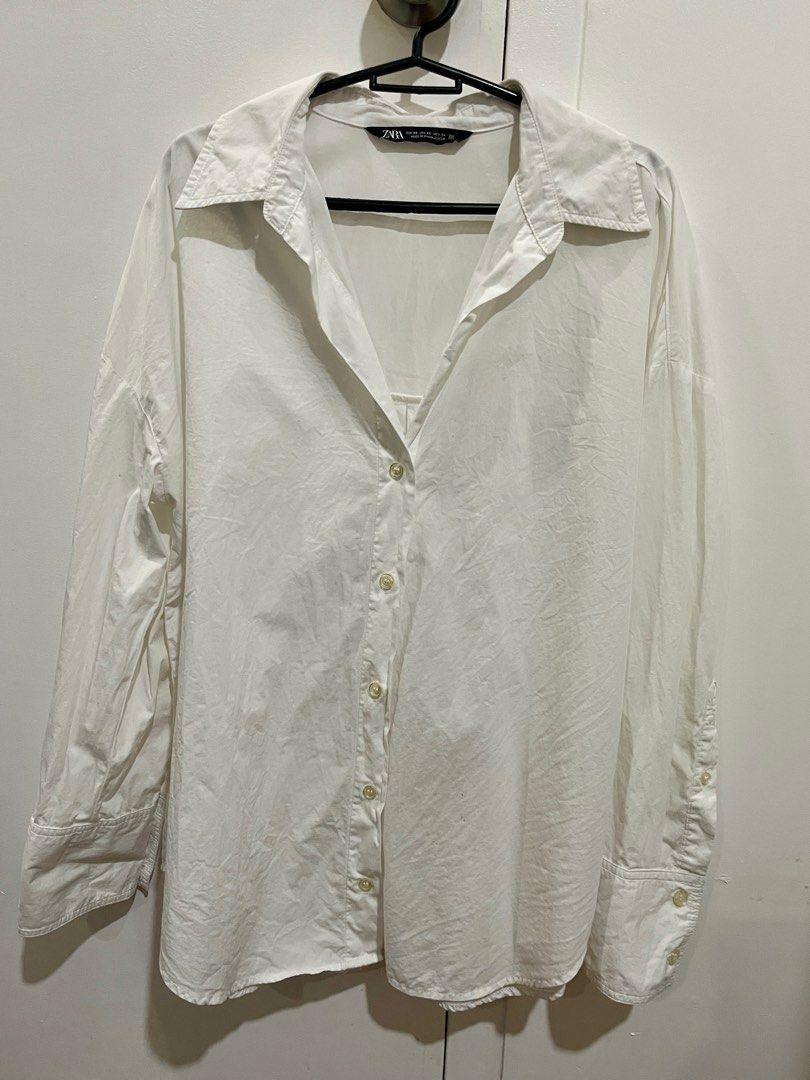 Zara white poplin shirt (Category: Longsleeves) located in Antipolo. Submitted by itsriac (Listing ID 1309114273, Image 1). Description: xs on tag fits up to medium no issues and flaws.