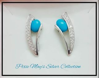 92.5 genuine silver earrings with natural blue stone