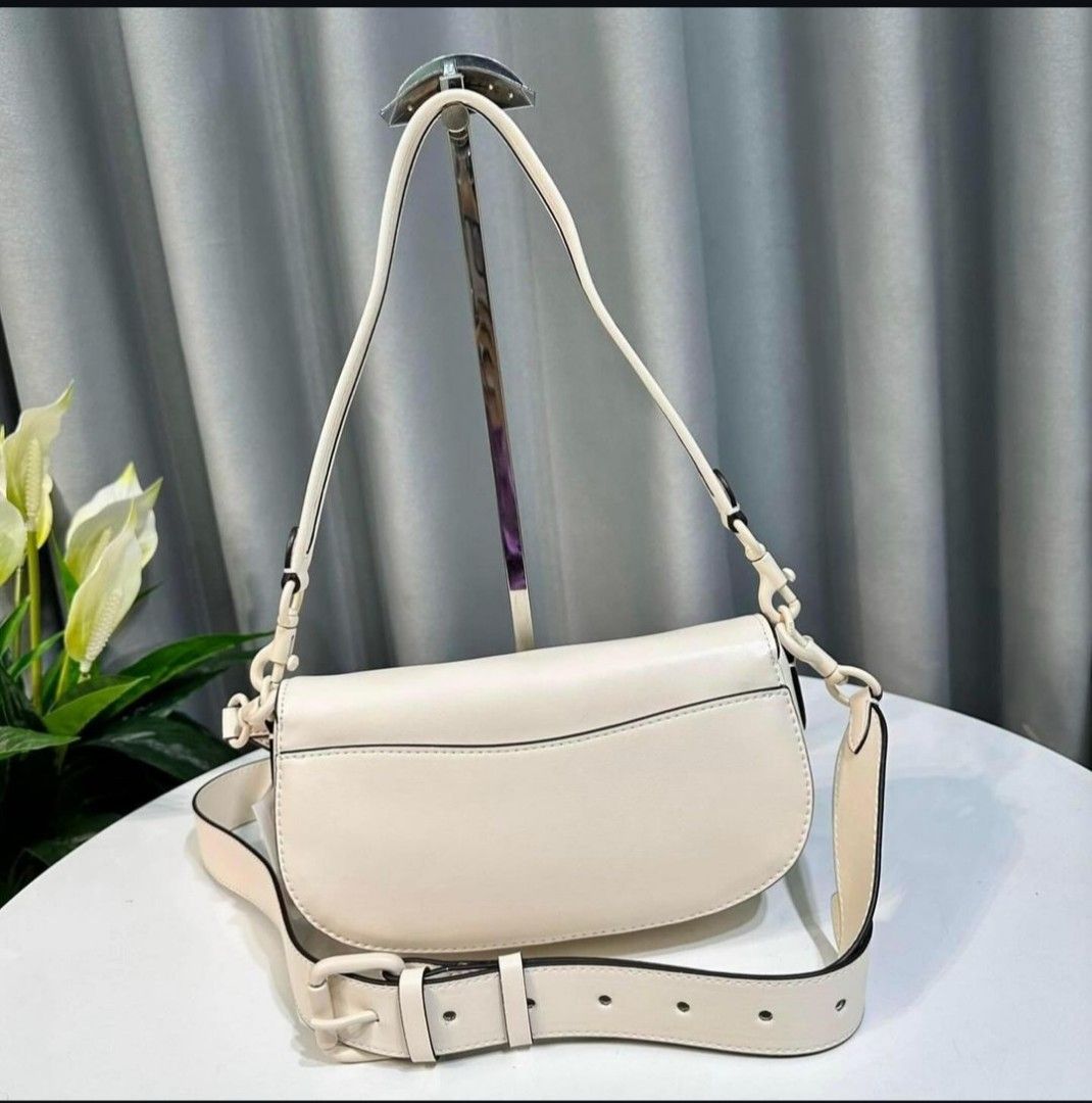 Coach tea rose saddle bag deals