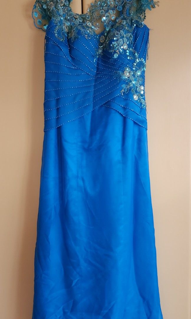 Elegant Blue laced beaded Gowl (Category: Evening dresses & gowns) located in Quezon City. Submitted by chinkytanseco07 (Listing ID 1309255094, Image 1). Description: RFS: Decluttering/Size up Payment first thru GCASH or BPI Sched: every weekend Price still negotiable with boning and gives good curve Made by Enan Almado Couture 📍Quezon City, Metro Manila.