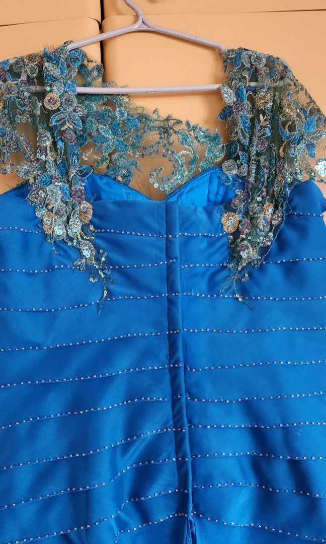 Elegant Blue laced beaded Gowl (Category: Evening dresses & gowns) located in Quezon City. Submitted by chinkytanseco07 (Listing ID 1309255094, Image 3). Description: RFS: Decluttering/Size up Payment first thru GCASH or BPI Sched: every weekend Price still negotiable with boning and gives good curve Made by Enan Almado Couture 📍Quezon City, Metro Manila.