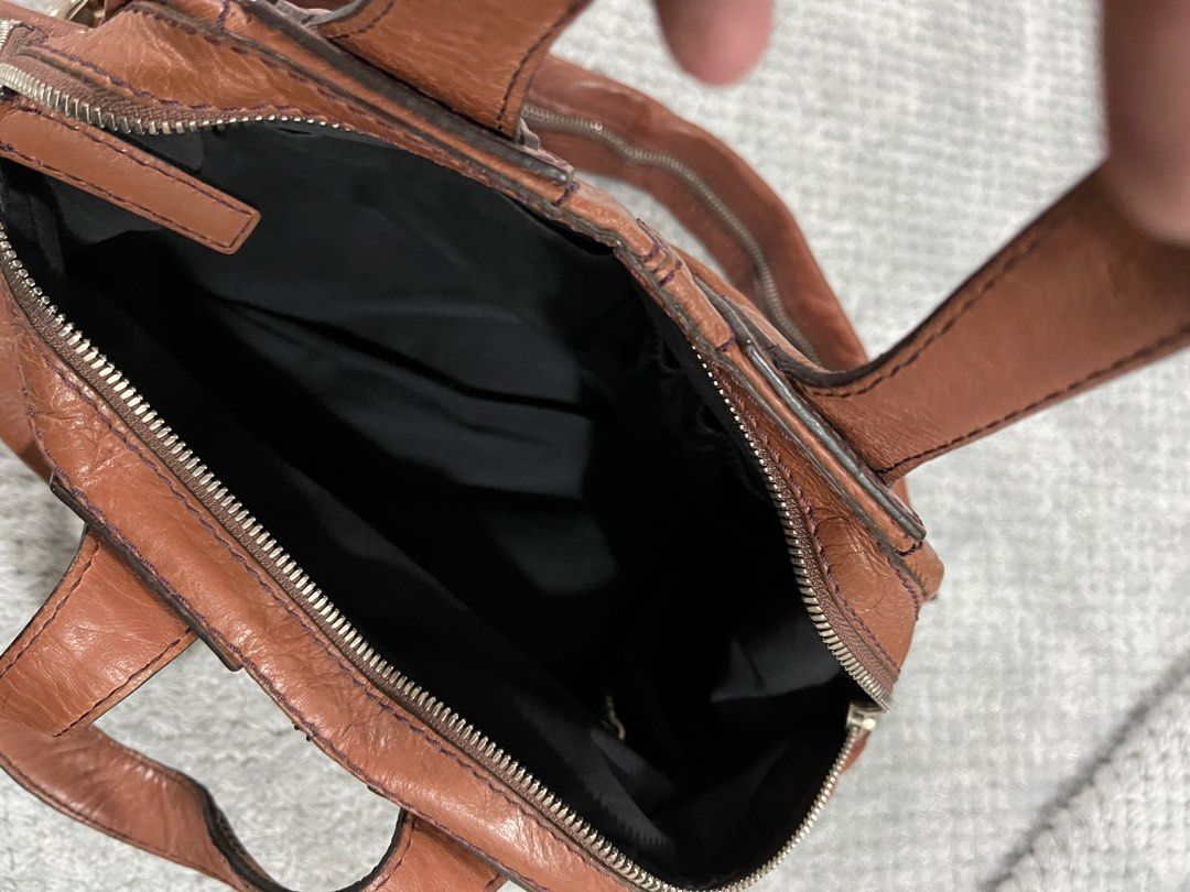 Givenchy Nightingale (Category: Luxury Bags & Wallets) located in Muntinlupa City. Submitted by vrhcloset (Listing ID 1309350657, Image 3). Description: Recolored Givenchy Nightingale Small. Recolored from Leather fix. Comes with dustbag only .