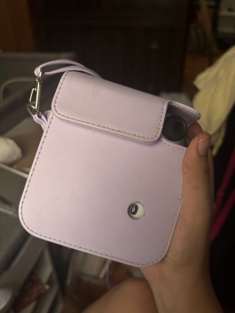 Instax Mini 12 (White) (Category: Cameras) located in Cavite. Submitted by mdvllflr (Listing ID 1309218357, Image 3). Description: For sale: Instax mini 12 Inclusions: - unit (white) - 2 batt - purple photo album - purple case.