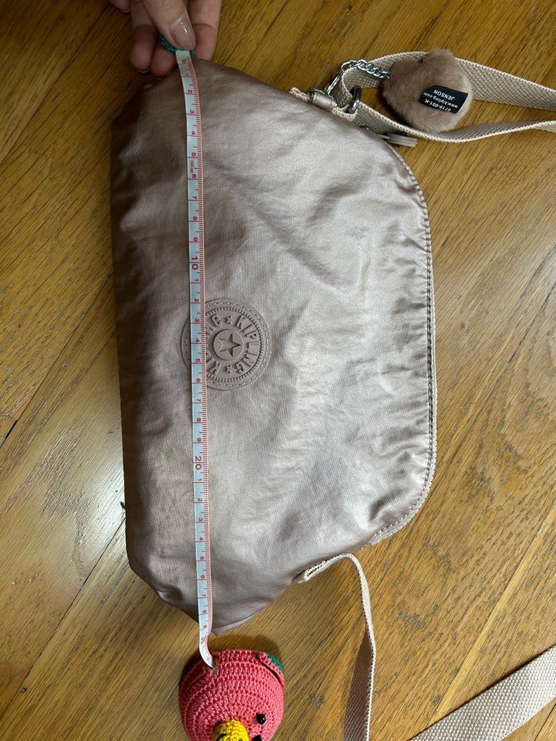 Kipling (Category: Cross-body Bags) located in Singapore. Submitted by tse_ern (Listing ID 1309279853, Image 3). Description: Never used before.. no stains.. brand new. Measurements as shown in the pictures.