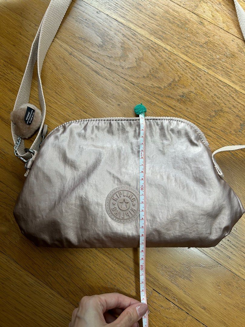 Kipling (Category: Cross-body Bags) located in Singapore. Submitted by tse_ern (Listing ID 1309279853, Image 4). Description: Never used before.. no stains.. brand new. Measurements as shown in the pictures.