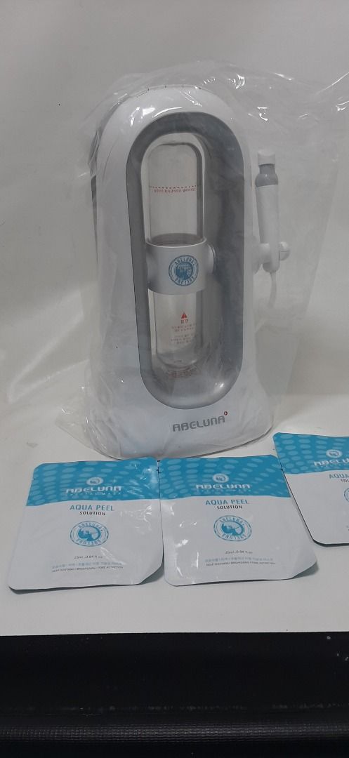 Original Abeluna Aqua Peeling Beauty Device (Category: Face Care) located in Makati City. Submitted by glempol-1 (Listing ID 1309337399, Image 1). Description: Unused with original box Brand new price: 14,000 ABELUNA FACIAL MACHINE AQUA-PEEL FACIAL OR HYDRADERMABRASION AT HOME. ABELUNA IS A FIRST-EVER PORTABLE AQUA-PEELING DEVICE THAT CAN PERFORM HYDRADERM FACIAL TREATMENT AT HOME. IT HAS A BEAUTIFUL DESIGN THAT WILL PERFECTLY FIT IN ANY INTERIOR